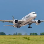 Airbus taking off against a blue sky