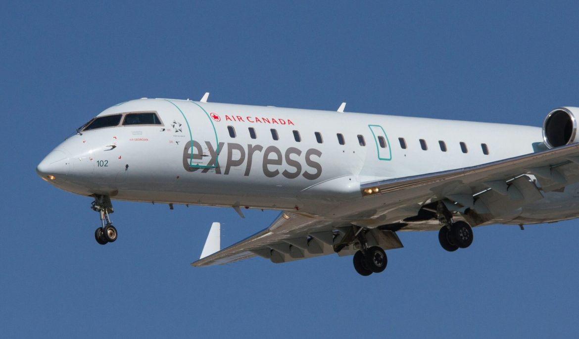 Air Canada Express Plane Flying Through the Air